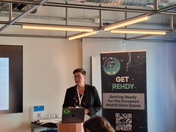 Ilse Vermeulen presenting at the HELT Symposium 2026