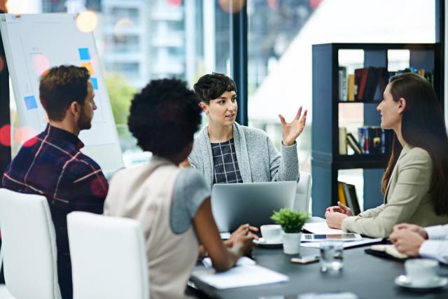 Group of business people having a meeting in a modern office